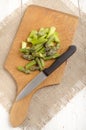 Cut Ã¢â¬â¹Ã¢â¬â¹green asparagus on a wooden board Royalty Free Stock Photo